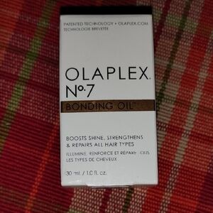 OLAPLEX No.7 Bonding Oil with White and Gold Packaging